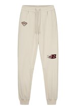 Black Bananas FLAMES - Tracksuit bottoms - sand - Zalando.de