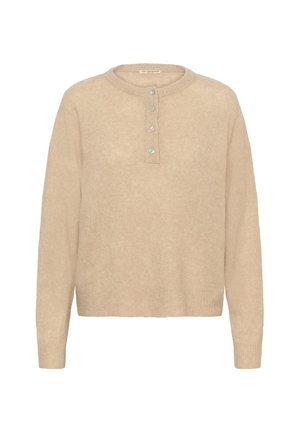 Beidzot adīts džemperis ar apaļu kakla izgriezumu, pogu slīdni ar caurspīdīgām pogām, kā arī ribotām piedurknēm un apakšmalu. Mīksta tekstūra, brīvs griezums.