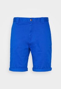 Ljusblå shorts i bomull med en slät yta. Har uppvikta fållar och en enda brun knapp i midjan.