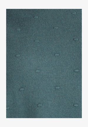 Tejido de punto verde azulado con una superficie texturizada, que presenta pequeños puntos elevados distribuidos uniformemente. Material suave y elástico.
