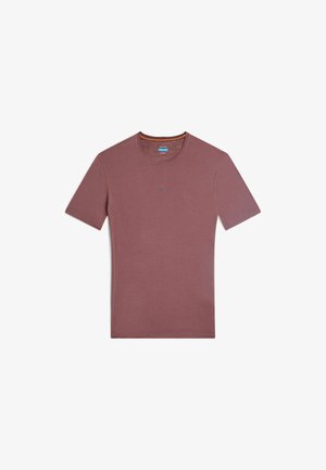 Lyhythihainen, pyöreäkauluksinen t-paita syvän mauven värisenä, jossa on teksturoitu kangas ja kontrastiväriset oranssit ompeleet saumoissa.