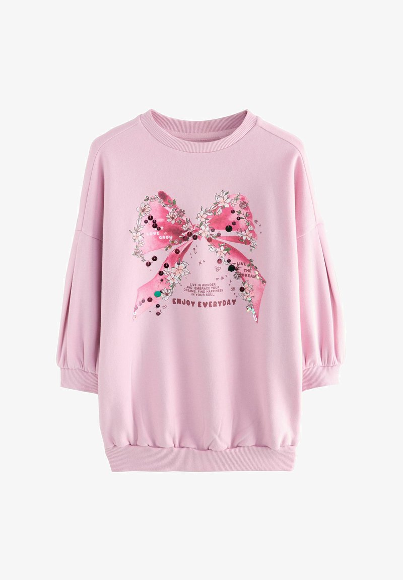 Lyserød langærmet sweatshirt med en stor lyserød sløjfe, blomsterdetaljer og inspirerende tekst inklusiv "Enjoy Everyday" på forsiden.
