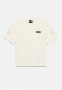 Hele kreemika puuvillane T-särk ümara kaelusega, lühikeste varrukate ja hõbedase EA7 logoplaadiga ning vasakul varrukal kolmed paralleelsed triibud.