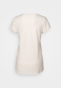 Vaaleanbeige lyhythihainen t-paita, joka on valmistettu pehmeästä puuvillasta ja jossa on rento istuvuus. Paidassa on pyöreä kaula-aukko ja jäykät pinnat. Ei näkyviä logoja tai yksityiskohtia.