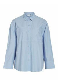 Camisa de botones azul claro con cuello estándar, mangas largas y dos bolsillos en el pecho. Fabricada con una tela suave de color sólido.