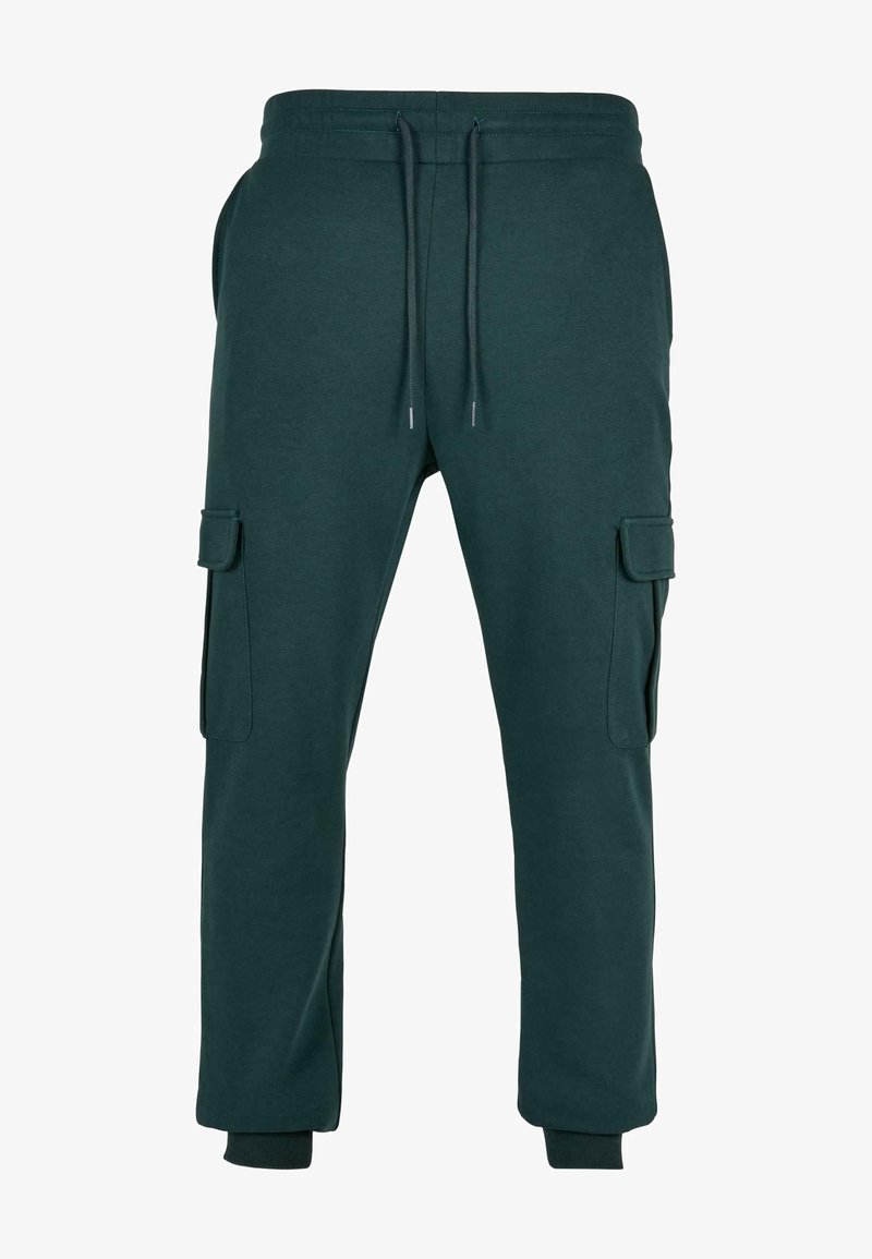 Pantalon jogger cargo vert foncé avec taille élastique, cordon de serrage, poches latérales à rabat et poignets côtelés.