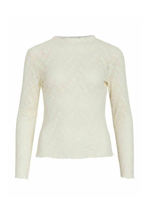 Lange mouwen, crèmekleurig kanten topje met een ronde halslijn en een gestructureerd bloemenpatroon. Heeft een aansluitend silhouet en details met een onafgewerkte zoom.