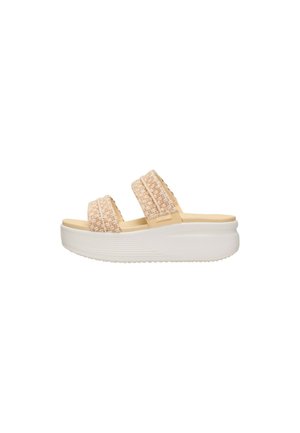 Sandalo con zeppa beige con due cinturini in tessuto strutturato e suola bianca spessa per uso casual da donna.