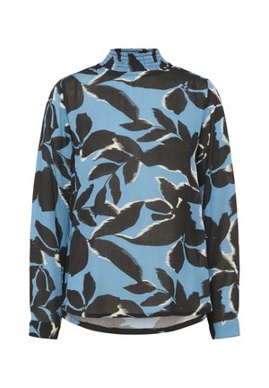 Blouse à manches longues avec col montant froncé, en tissu bleu avec de grands motifs de feuilles abstraites en noir et blanc.