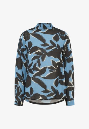 Bluza z dolgimi rokavi s nabranim visokim ovratnikom, ki je izdelana iz modrega blaga z velikimi črnimi in belimi abstraktnimi vzorci listov.