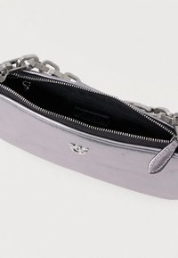 Metallic silver clutch bag with a smooth texture, featuring a zip closure, black interior, and a chunky silver chain strap.