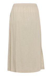 Beige, knælang skirt lavet af blødt stof med elastisk talje og sideslids for nem bevægelse. Glat tekstur, minimalistisk design.