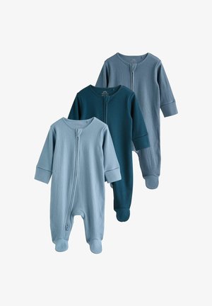 Tre ribbede bomuldsbodyer med lange ærmer til babyer med foddækkende i nuancer af lyseblå, mørk teal og afdæmpet blå, arrangeret overlappende.