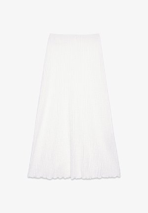 Valge midi-seelik tekstureeritud, kortsus kangast. Omab sujuvat vööd ja laienevat lõiget, lõpetatud lainelise äärisega.