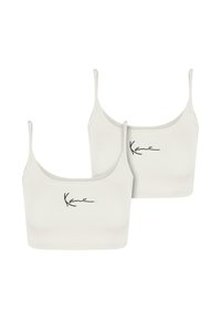 Dvoje bielych bavlnených braletiek s tenkými popruhmi, s čiernym podpisovým logom na prednej strane. Hladká textúra a jednoduchý dizajn.