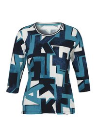 Blauw-witte longsleeve shirt met geometrische patronen, voorzien van een ronde halslijn en een zachte stofstructuur.