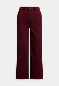 Platas, plaša stila bikses bordo krāsā, izgatavotas no kokvilnas. Tām ir augsts viduklis, priekšā poga aizdare un divas kabatas aizmugurē. Gluda tekstūra.