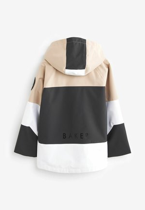 Veste de pluie en coloris beige, noir et blanc; dotée d'une capuche et d'un logo dans le dos. Fabriquée en tissu lisse et imperméable.