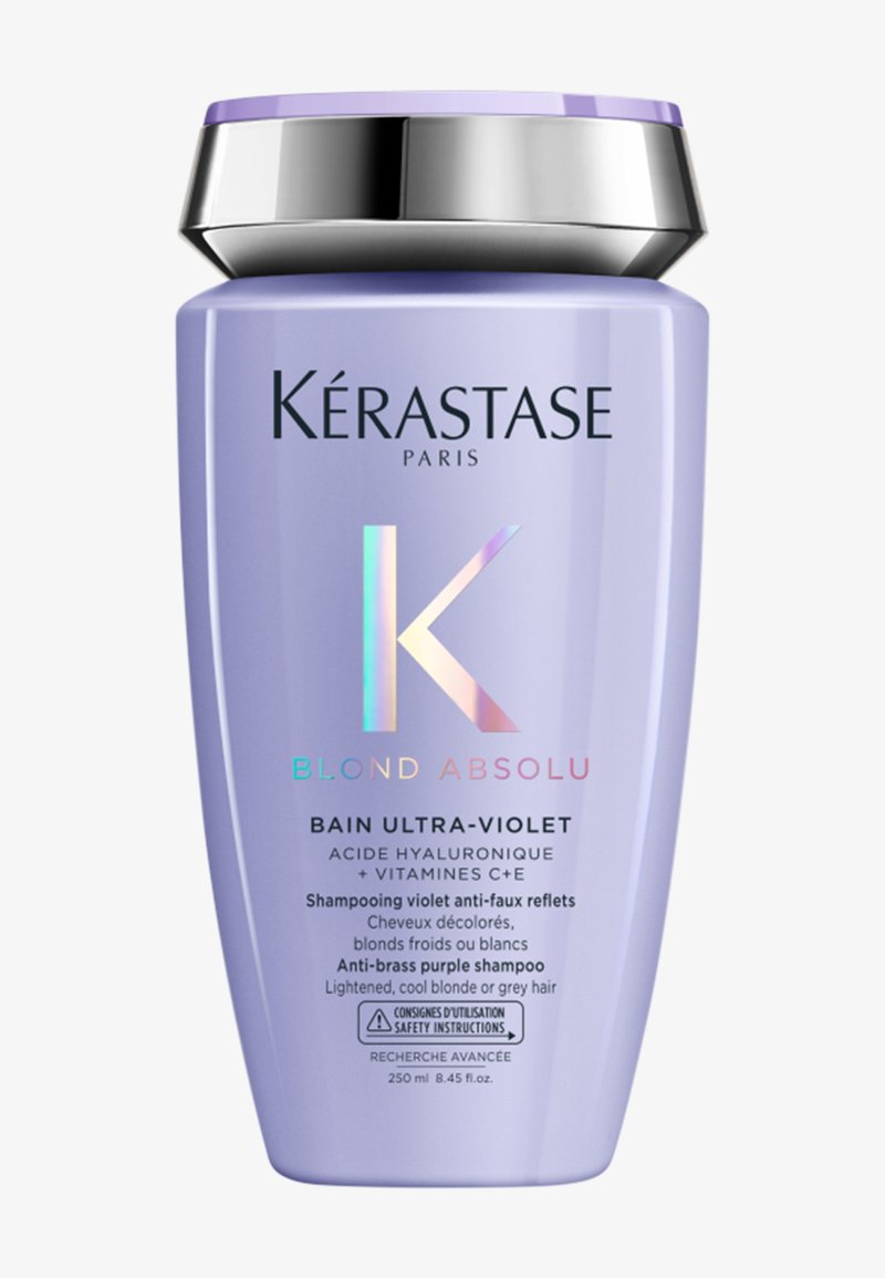 Kérastase Blond Absolu Bain Ultra-Violet paarse shampoo fles voor verlicht, koel blond of grijs haar, 250 ml met zilverkleurige dop.