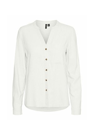 Witte lange mouwen shirt met V-hals, voorzien van een rij bruine knopen aan de voorkant en een borstzak. Zachte, gestructureerde stof.