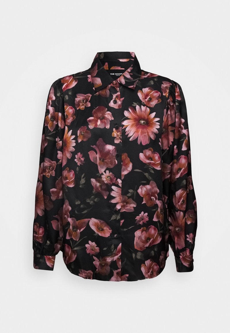 Chemise noire à manches longues avec boutons, ornée d'un grand imprimé floral rose et orange, avec un col pointu.