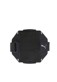 Bras de soutien noir en tissu durable avec des sangles ajustables, arborant un logo Puma gris et des accents réfléchissants pour plus de visibilité.