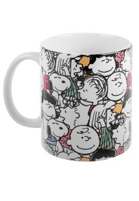 Tazza in ceramica bianca con un motivo colorato di personaggi dei cartoni animati, prevalentemente con contorni neri, e rifiniture in verde, rosa e arancione.