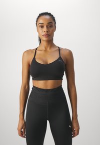 Puma MOVE YOGINI - Sportski grudnjak s blagom potporom - black