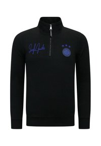 Zwarte sweatshirt met een kwart rits, paarse stiksels en logo-details, met drie sterren en een handtekening op de linkerborst.