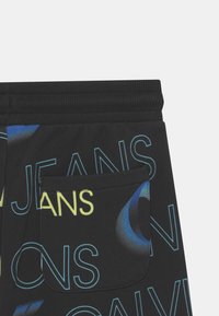 Calvin Klein Jeans PIXELATED - Jogginghose - black