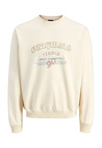 Cremefarvet sweatshirt med ribbede manchetter og nederkant. Har trykt tekstdesign i afdæmpede farver. Blødt stof med en afslappet pasform.