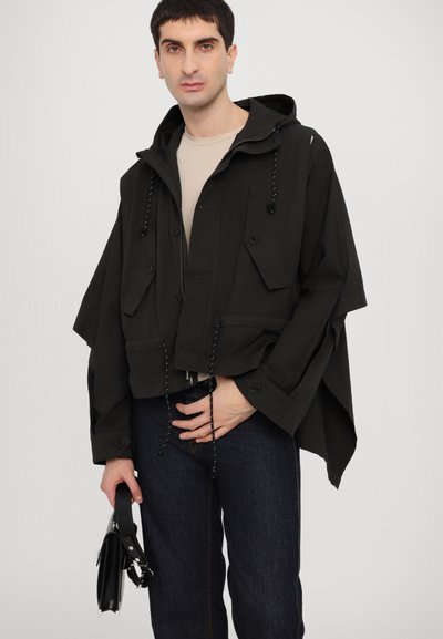 Henrik Vibskov UNCUT SHORT UNISEX - Jachetă parka - black
