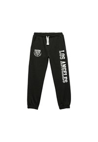 Svarta sweatpants med elastiska muddar, med vit tryckt text som läser "LOS ANGELES" och en cirkulär logo med "CHAMPIONS 1978."