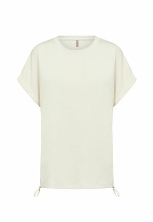 Krémovo-biele tričko s krátkym rukávom, s nohavicami zrolovanými na koncoch a nastaviteľnými šnúrkami na spodnom okraji, zobrazené na bielom pozadí.
