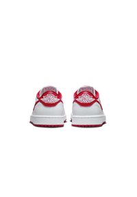 Sneaker bianche con accenti rossi, tomaia in pelle liscia, colletto imbottito e suola in gomma. Presentano un logo ricamato sul tallone.