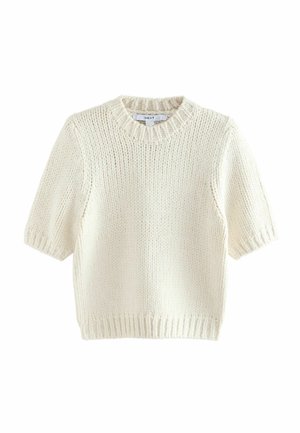 Krémový pletený svetr s krátkými rukávy, ribbovaným výstřihem a lemem, s volným střihem a hrubou texturou příze. Visačka připevněná na výstřihu.