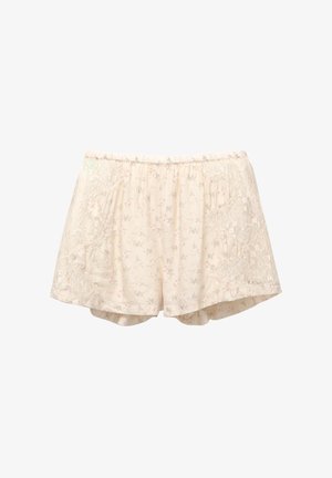 Blomsterprintede shorts med elastisk talje, lavet af let stof. Har blonde detaljer i siderne og bløde, pastelfarver.