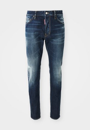Dunkelblaue Jeans im Slim-Fit-Schnitt, mit verwaschenen Stellen an den Oberschenkeln und Knien, fünf Taschen und einem Metallknopfverschluss.