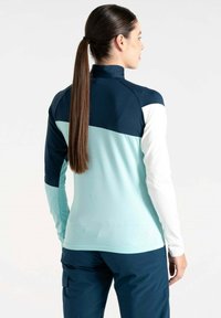 Langärmliges Oberteil mit einem Farbblockdesign in Marineblau, Hellblau und Weiß. Hergestellt aus leichtem, glattem Material mit hohem Kragen.