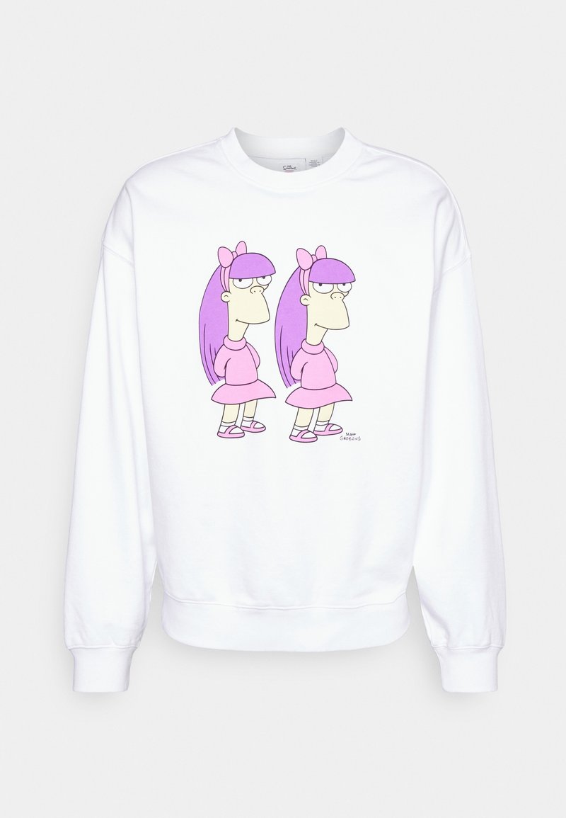 Vit sweatshirt med en karikatyrgrafik av två karaktärer med lila hår, som bär rosa klänningar och rosetter, på framsidan.