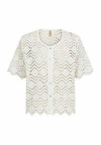 Cardigan à manches courtes en dentelle blanche, présentant un motif en chevrons, un col rond et une fermeture à boutons avec des bords festonnés à l'ourlet.