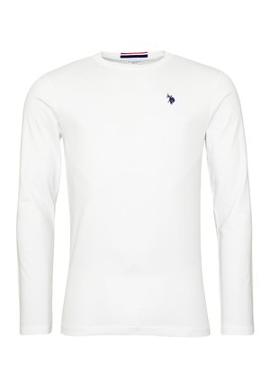 Witte langemouw t-shirt van katoen. Bevat een ronde halslijn en een klein marineblauw logo op het linkerborstgedeelte. Gladde textuur.
