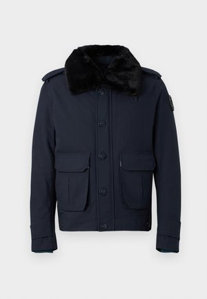 Navy blue jacket with a faux fur collar, button closure, and two front pockets. Features shoulder epaulets and additional detailing on the sleeve.