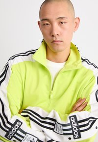 adidas Originals MEGABREAK - Giacca sportiva - bahia glow