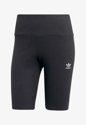 Zwarte geribbelde fietsbroek met een hoge tailleband. Bevat een klein wit Adidas-logo aan de onderzijde aan de linkerkant. Gladde stofstructuur.