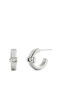 Silver hoop earrings with a polished surface. Circular shape with a hinged closure detail, exhibiting a smooth, sleek design.
