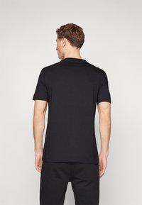 HUGO DULIVE - T-shirts print - black