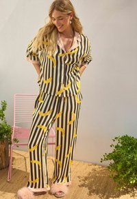 Rockett St George SET - Pyžamová sada - monochrome stripe banana print