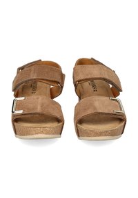 Brown suede platform sandals with two adjustable straps and a metallic buckle; cork footbed and rubber sole for comfort.
