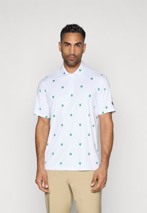 Witte polo met korte mouwen en een groen vierkant patroon. Materiaal lijkt glad; kraag met drie knopen, eenvoudig ontwerp.
